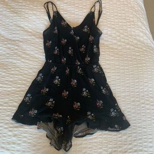 Garage black floral romper (size XS)